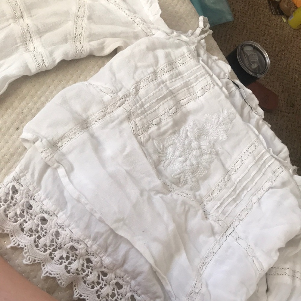a guess kinda off the shoulder white long sleeve